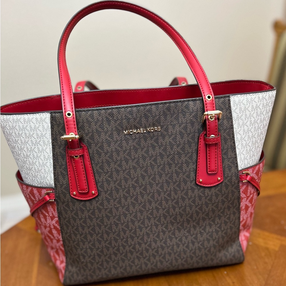 Michae Kors red and cream shades